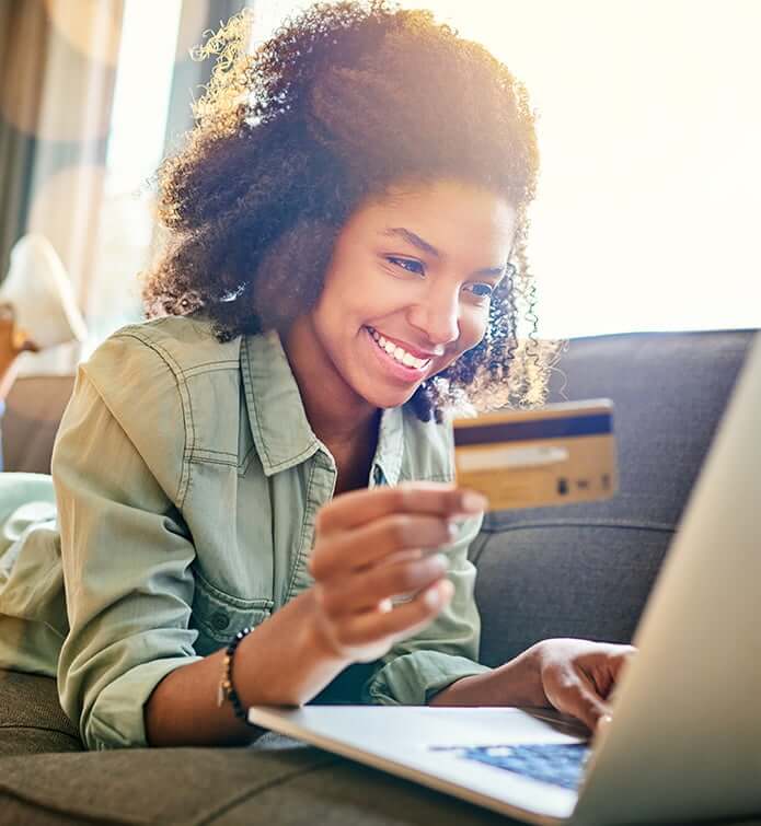 happy woman paying bill