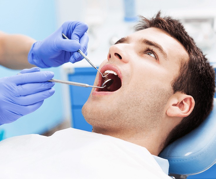 man at the dentist