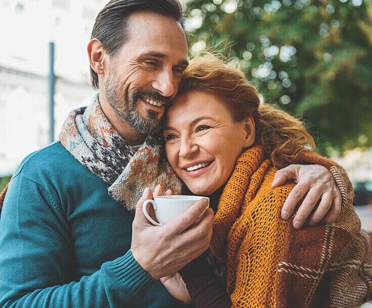 happy couple enjoying coffee together