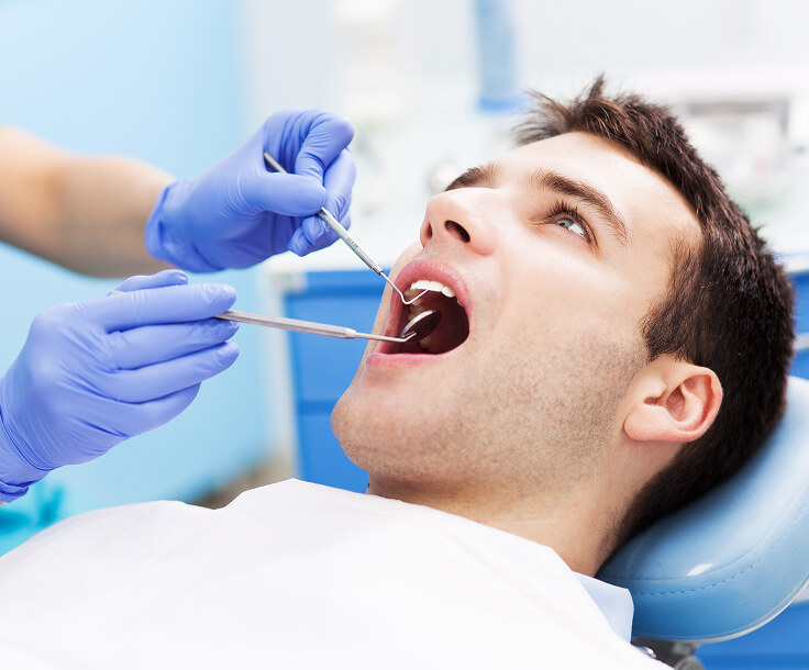 man at the dentist